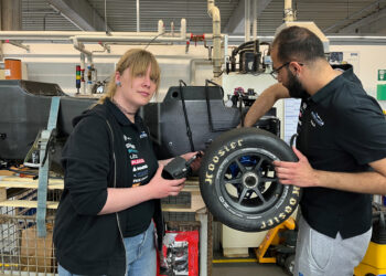 Prospective engineers from the FaSTDa team assemble the cooling system in NORMA Group's prototype construction.
