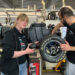 Prospective engineers from the FaSTDa team assemble the cooling system in NORMA Group's prototype construction.