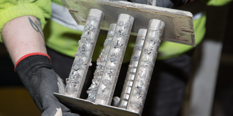 Ferrous metal in recycled plastic captured on Tube Magnets