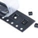 Reel-to-reel overmolded time-of-flight sensor lens made from EXTEM resin