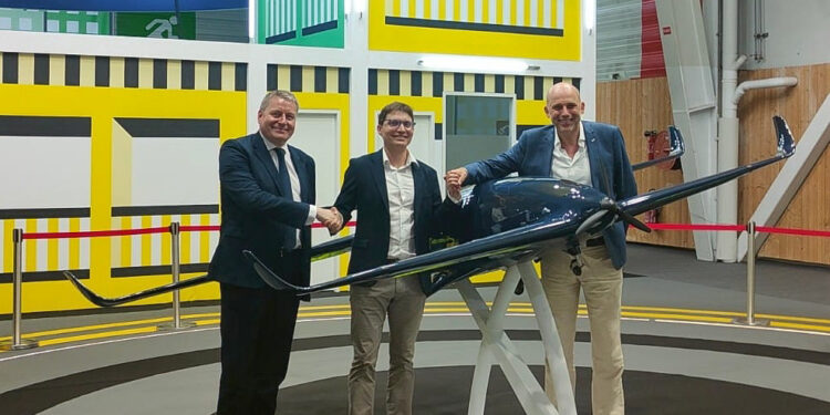 Photo of Ascendance Flight Technologies and Solvay representatives at the signing event. At the 2023 Paris Air Show, Solvay and Ascendance Flight Technologies have signed a partnership to collaborate in the development of innovative material and aerospace technologies for enhancing the safety, efficiency and sustainability of future aircraft. From left: Gerald Perrin, Solvay EMEA Business Manager; Jean-Christophe Lambert, CEO of Ascendance Flight Technologies and Stéphane Viala, Director of Engineering & Program at Ascendance Flight Technologies.